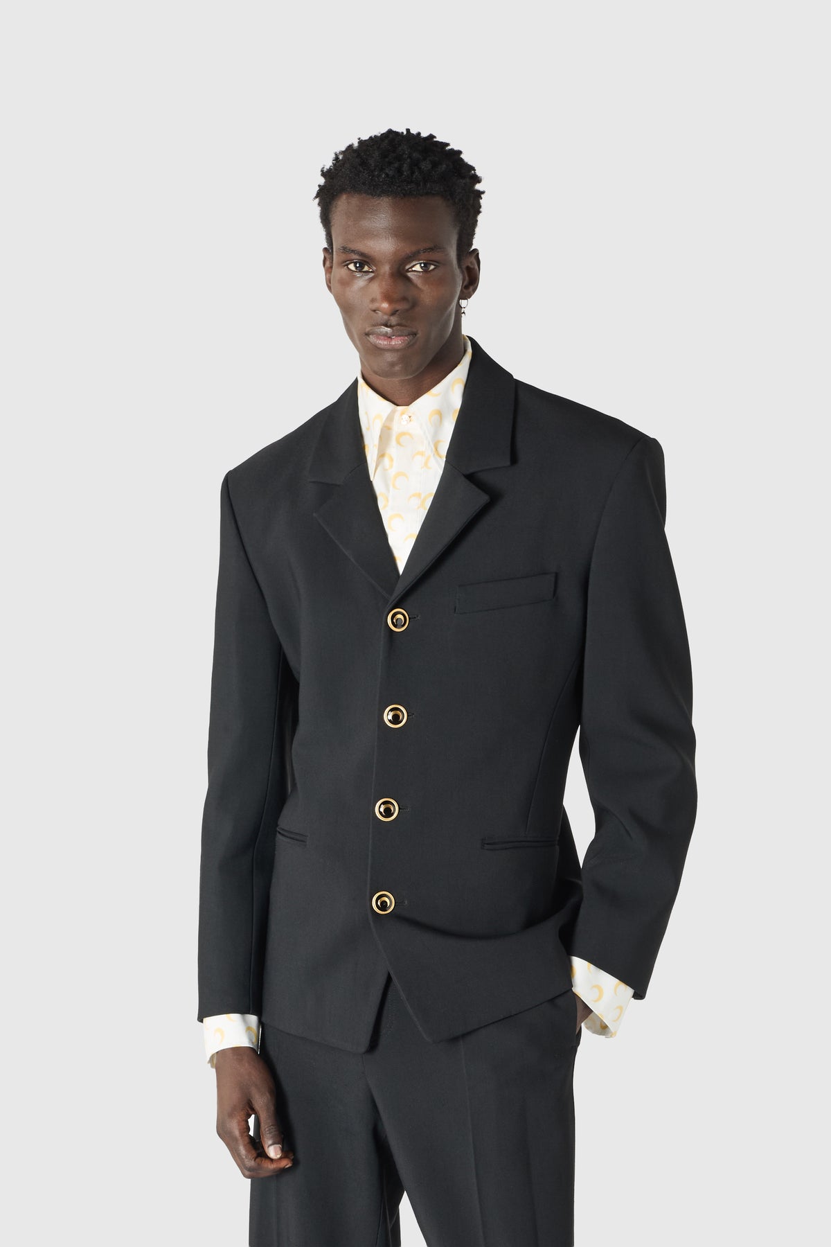 Veste tailleur en serge de laine à boutons dorés