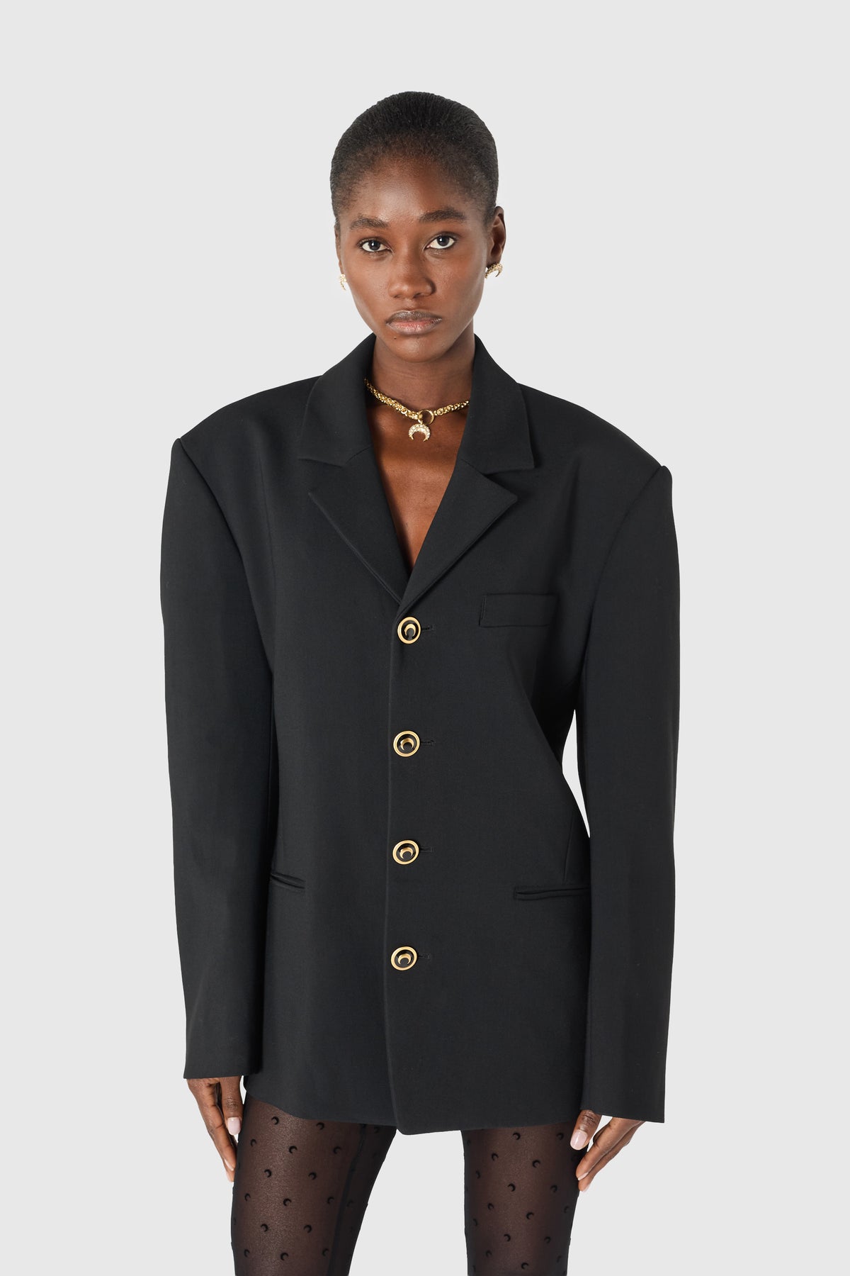 Veste tailleur en serge de laine à boutons dorés